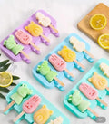 https://cdn.shopify.com/s/files/1/0925/0203/2693/files/WJI089-4-Cavity-Silicone-Ice-Cream-Mould_All_5961_1-1.webp?v=1736057465