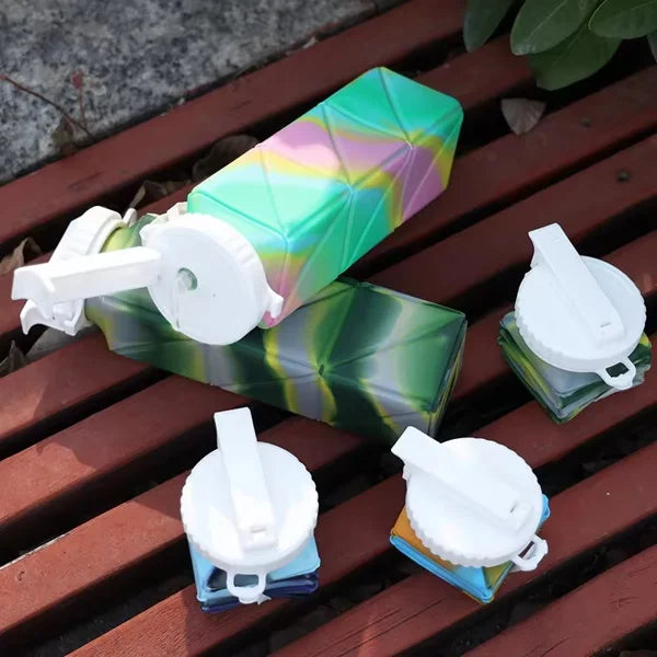 https://cdn.shopify.com/s/files/1/0925/0203/2693/files/WJI675-Silicone-Foldable-Water-Bottle_All_5813_1-2.webp?v=1736089695